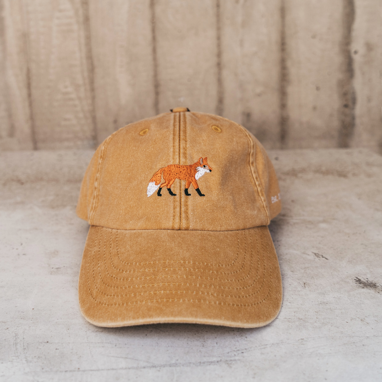 Gelbe Cappy mit gesticktem Fuchs
